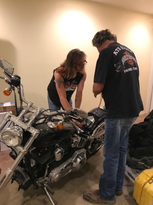 Bubba and Scott working on the Harley2